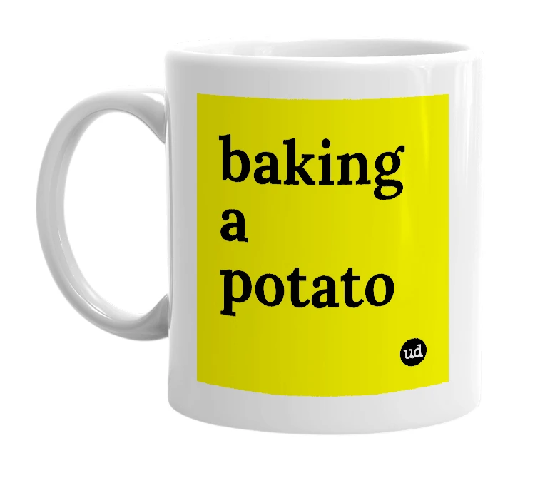 White mug with 'baking a potato' in bold black letters