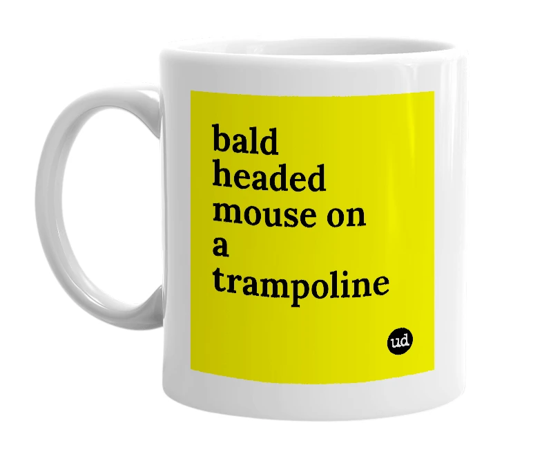 White mug with 'bald headed mouse on a trampoline' in bold black letters