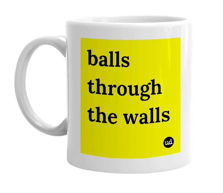 White mug with 'balls through the walls' in bold black letters