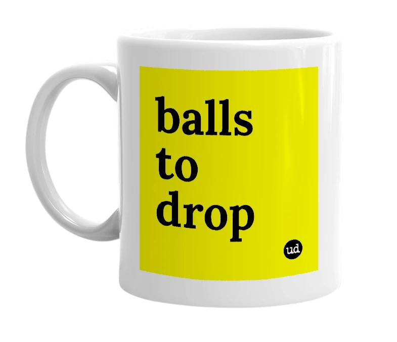 White mug with 'balls to drop' in bold black letters