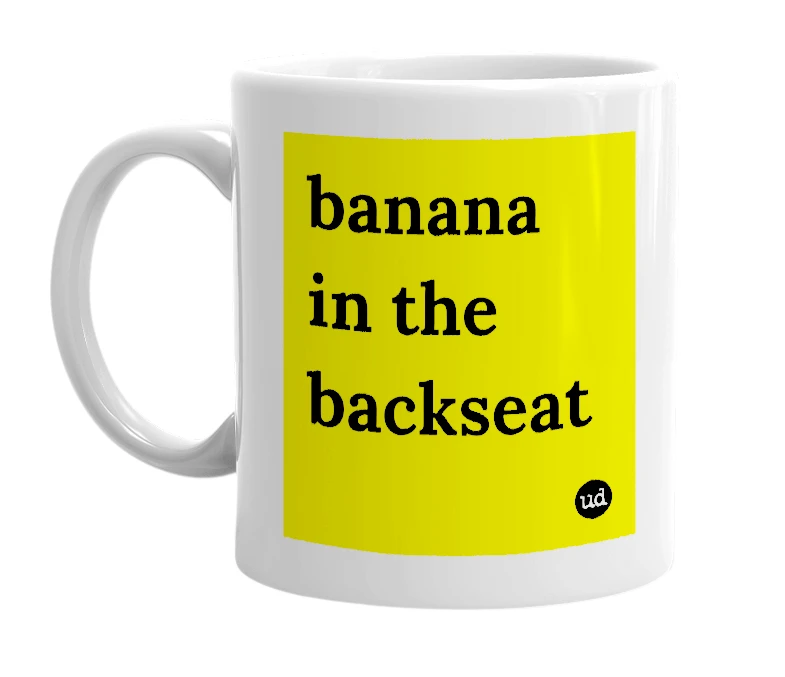 White mug with 'banana in the backseat' in bold black letters