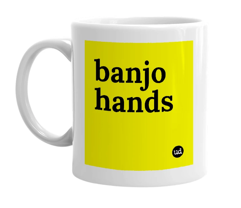 White mug with 'banjo hands' in bold black letters