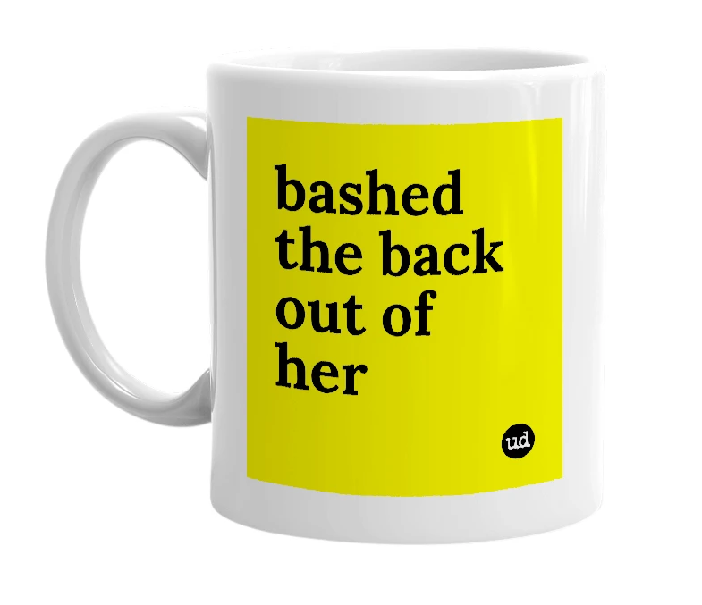 White mug with 'bashed the back out of her' in bold black letters