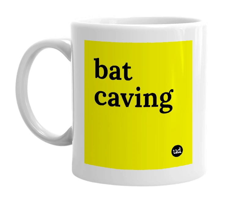 White mug with 'bat caving' in bold black letters