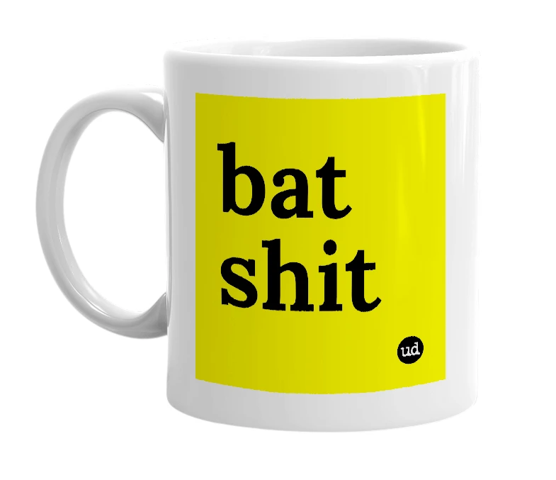 White mug with 'bat shit' in bold black letters