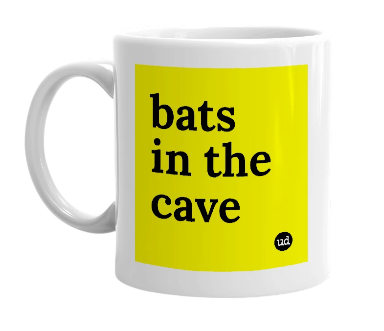 White mug with 'bats in the cave' in bold black letters