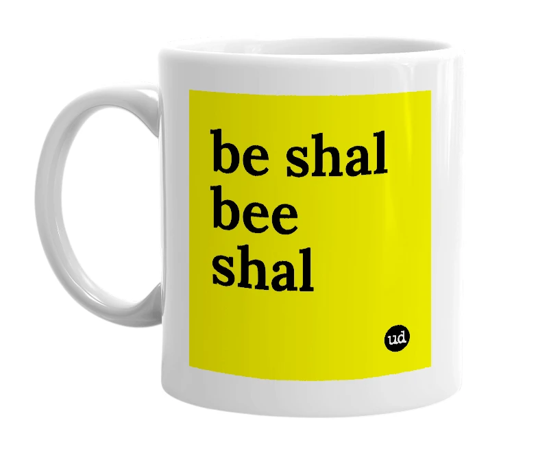 White mug with 'be shal bee shal' in bold black letters