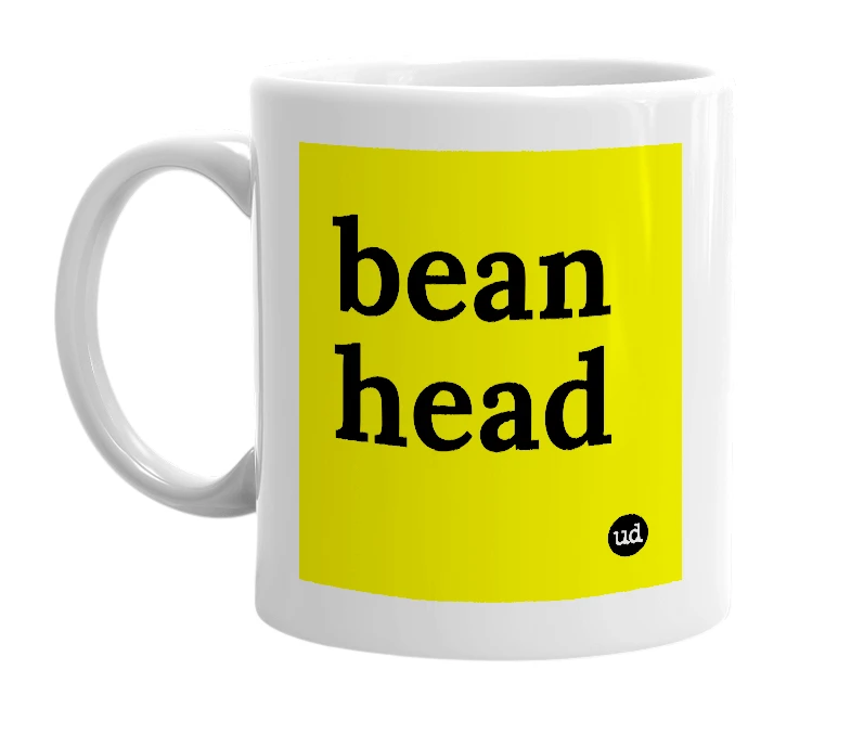 White mug with 'bean head' in bold black letters