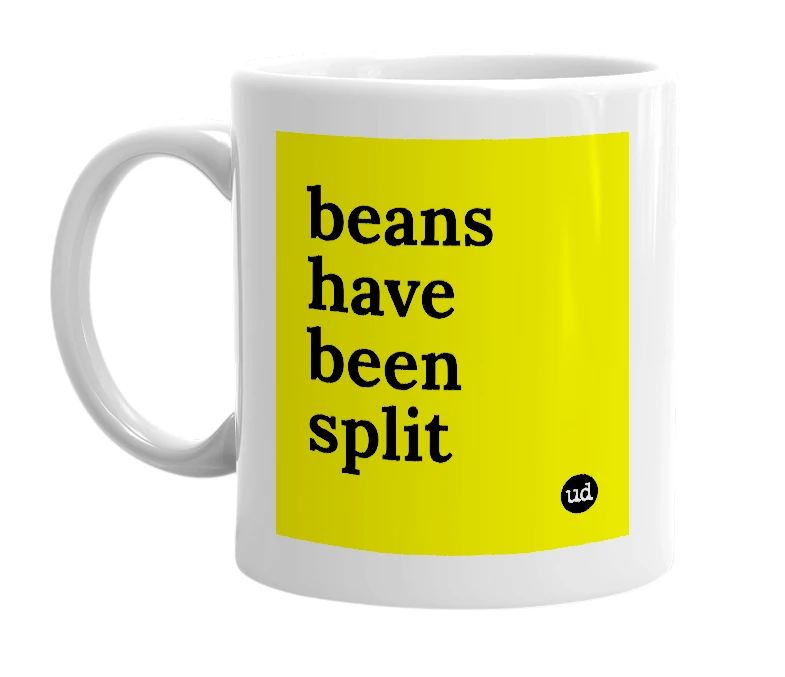 White mug with 'beans have been split' in bold black letters
