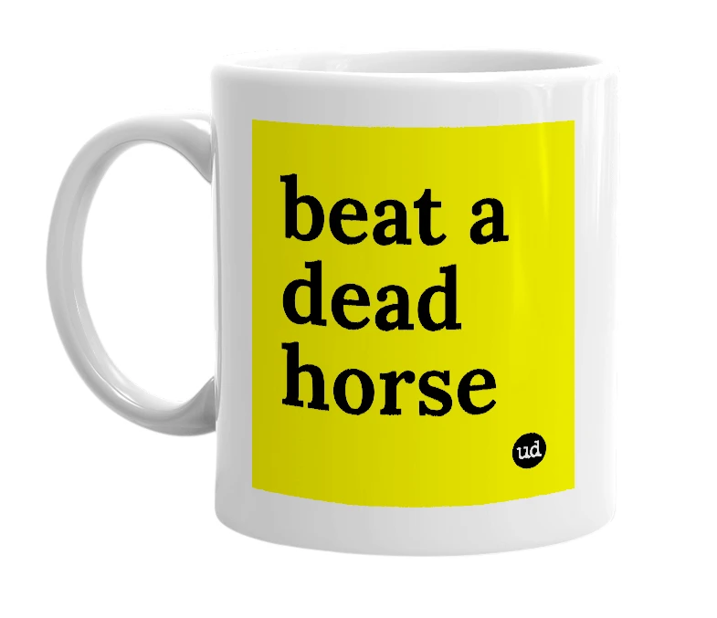 White mug with 'beat a dead horse' in bold black letters