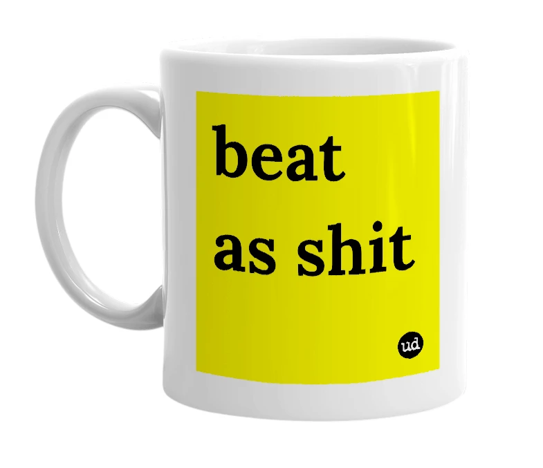 White mug with 'beat as shit' in bold black letters