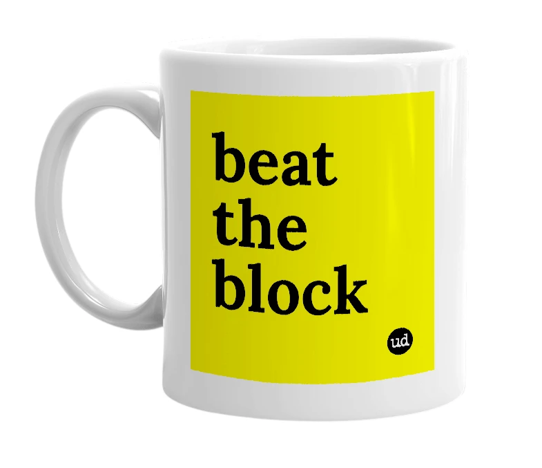 White mug with 'beat the block' in bold black letters