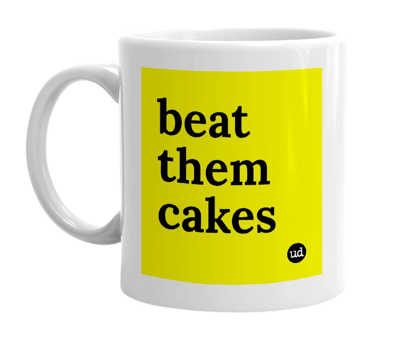 White mug with 'beat them cakes' in bold black letters