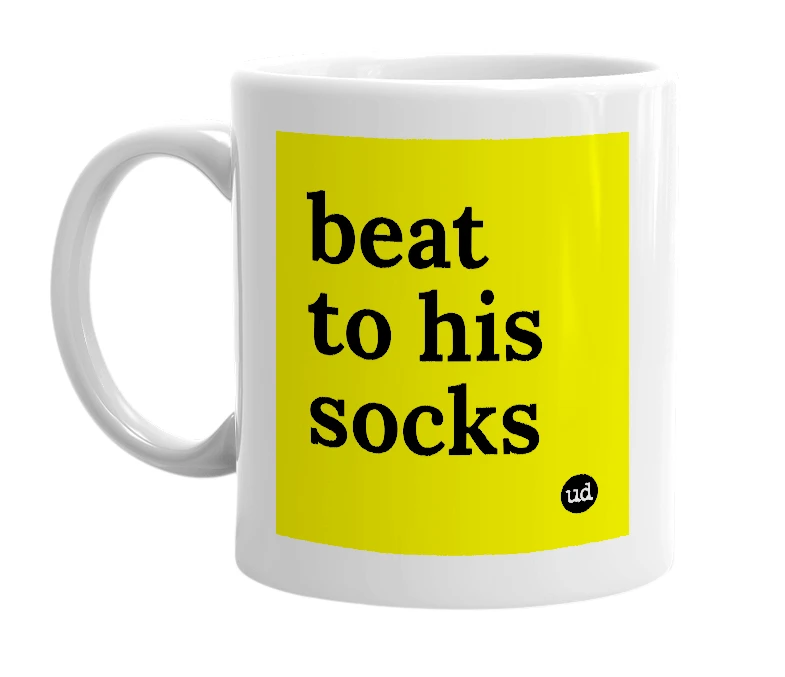 White mug with 'beat to his socks' in bold black letters