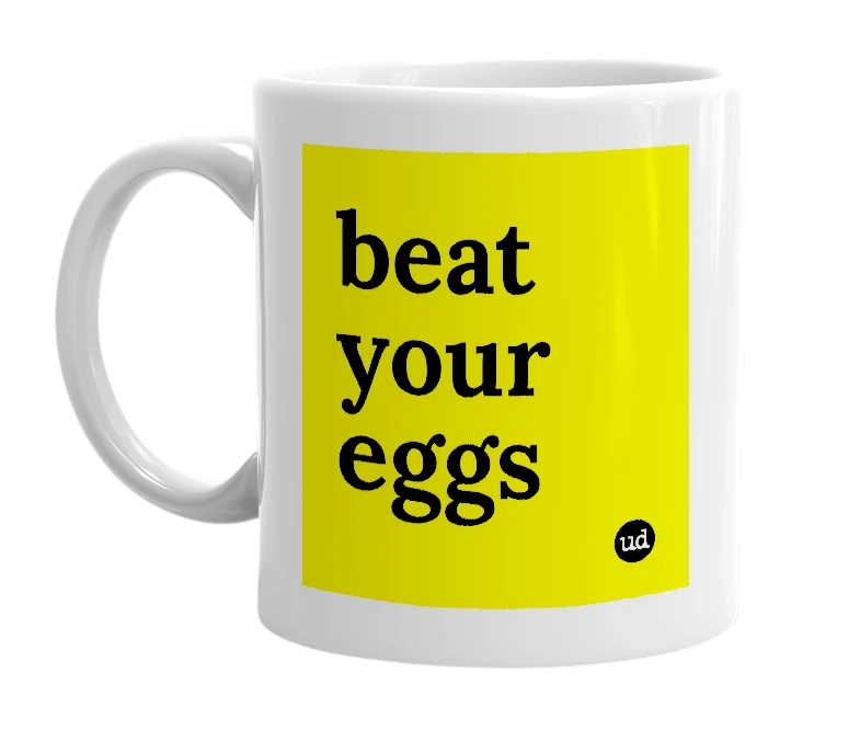 White mug with 'beat your eggs' in bold black letters