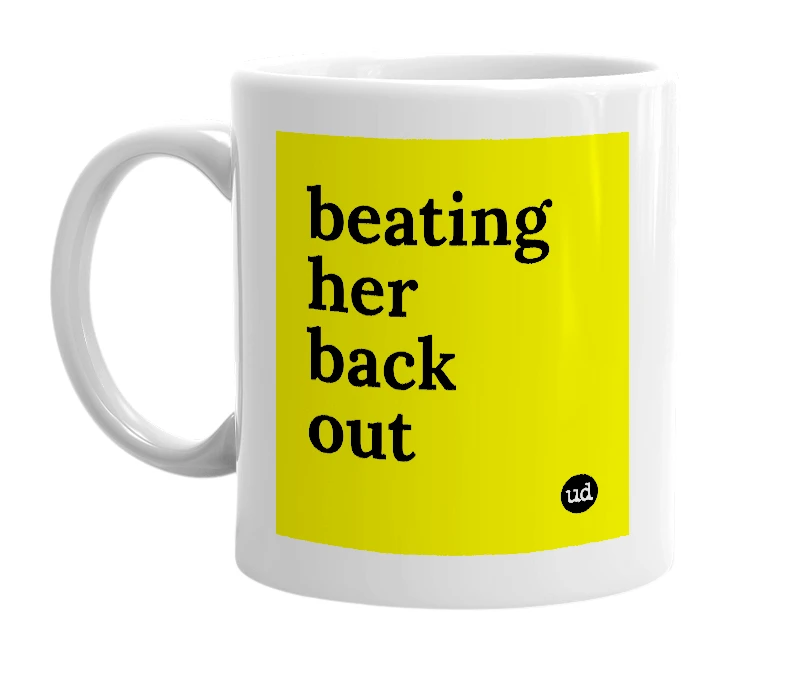 White mug with 'beating her back out' in bold black letters