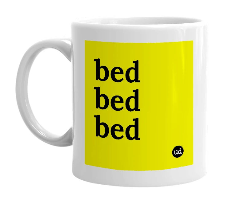 White mug with 'bed bed bed' in bold black letters