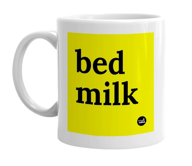 White mug with 'bed milk' in bold black letters