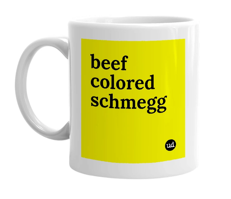 White mug with 'beef colored schmegg' in bold black letters