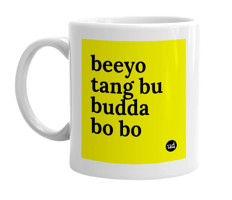 White mug with 'beeyo tang bu budda bo bo' in bold black letters