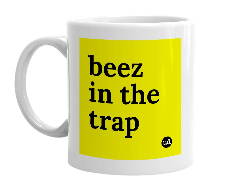 White mug with 'beez in the trap' in bold black letters