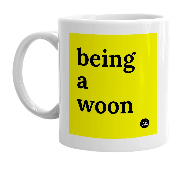 White mug with 'being a woon' in bold black letters