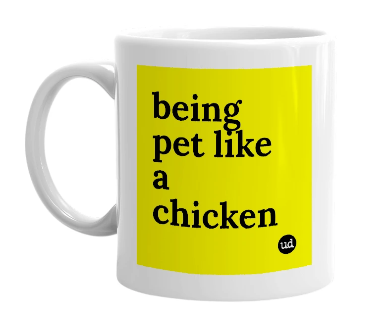 White mug with 'being pet like a chicken' in bold black letters