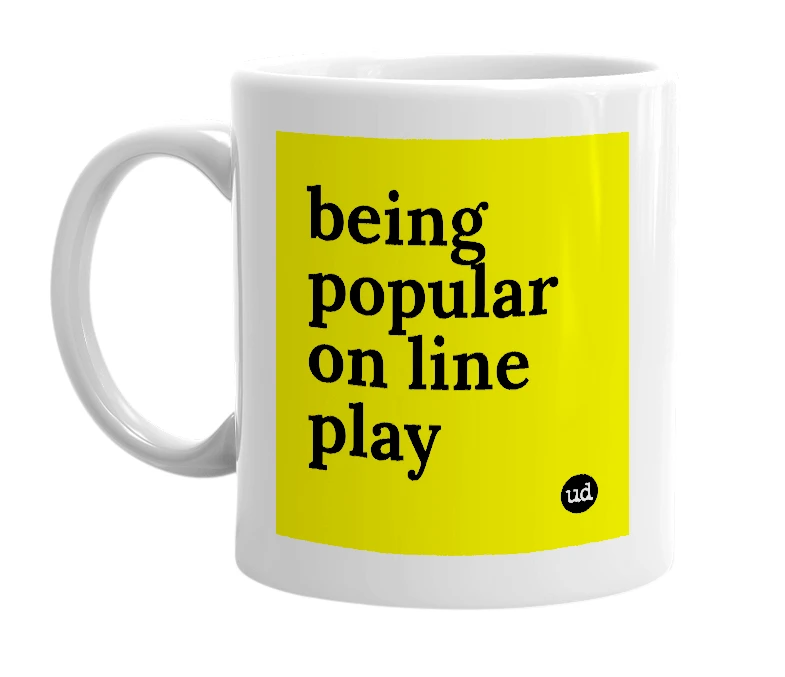 White mug with 'being popular on line play' in bold black letters