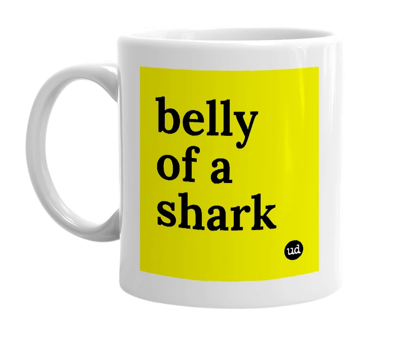 White mug with 'belly of a shark' in bold black letters