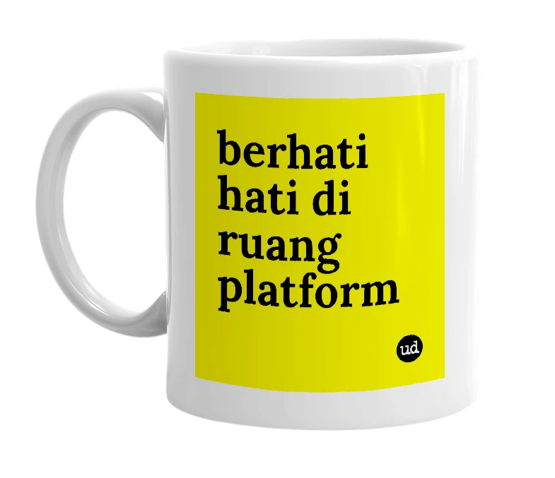 White mug with 'berhati hati di ruang platform' in bold black letters