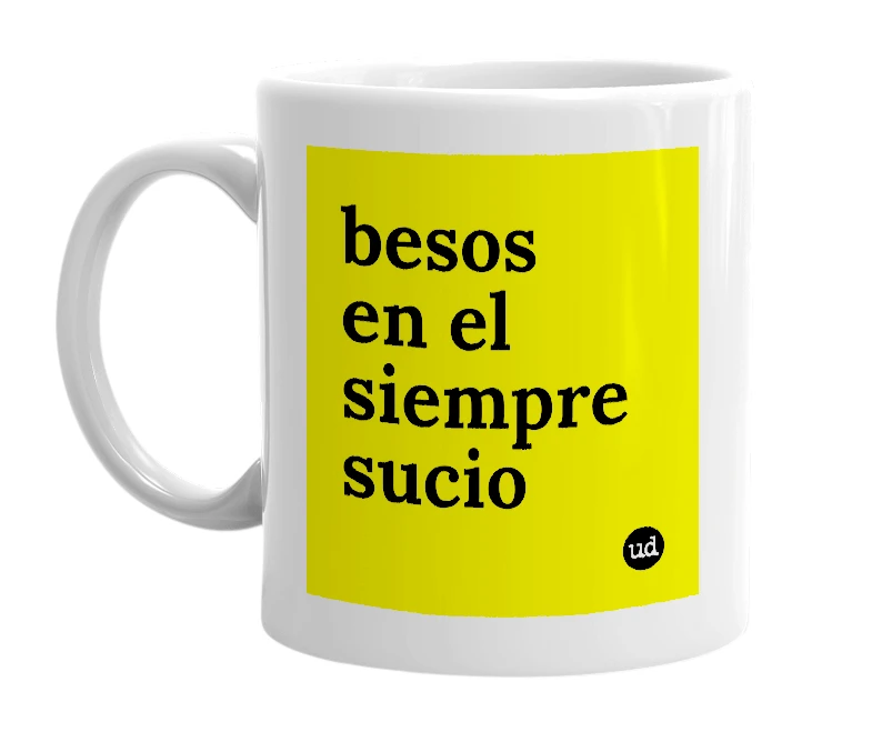 White mug with 'besos en el siempre sucio' in bold black letters