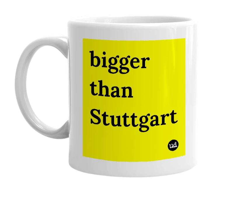 White mug with 'bigger than Stuttgart' in bold black letters