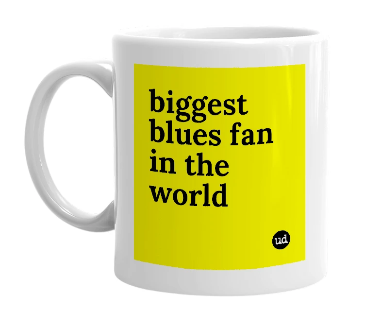 White mug with 'biggest blues fan in the world' in bold black letters