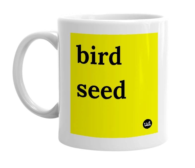 White mug with 'bird seed' in bold black letters