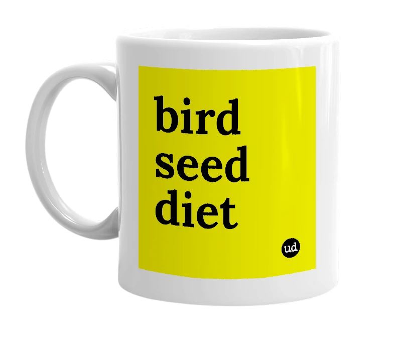 White mug with 'bird seed diet' in bold black letters