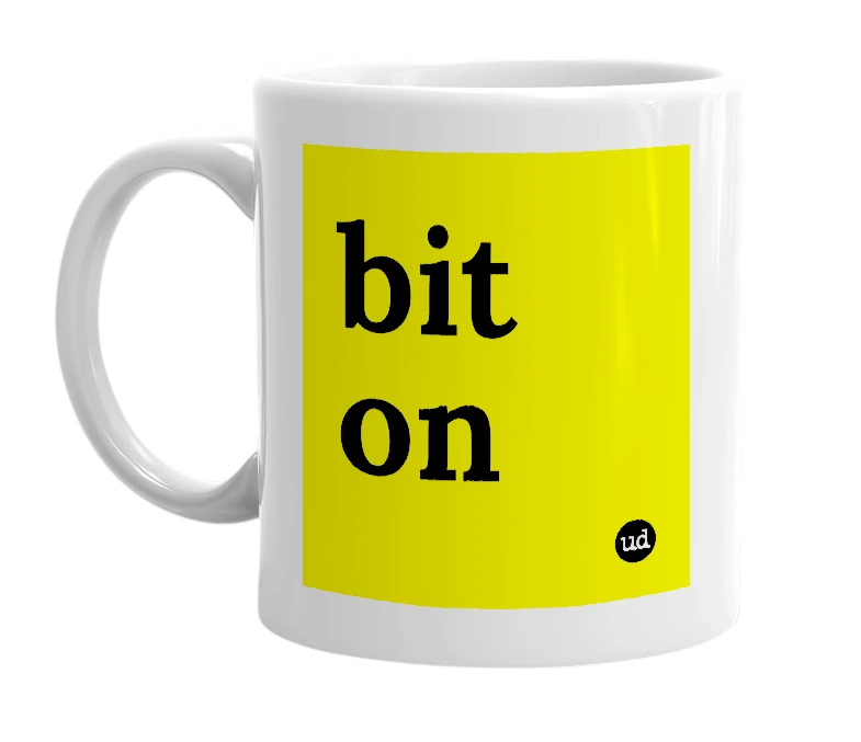 White mug with 'bit on' in bold black letters