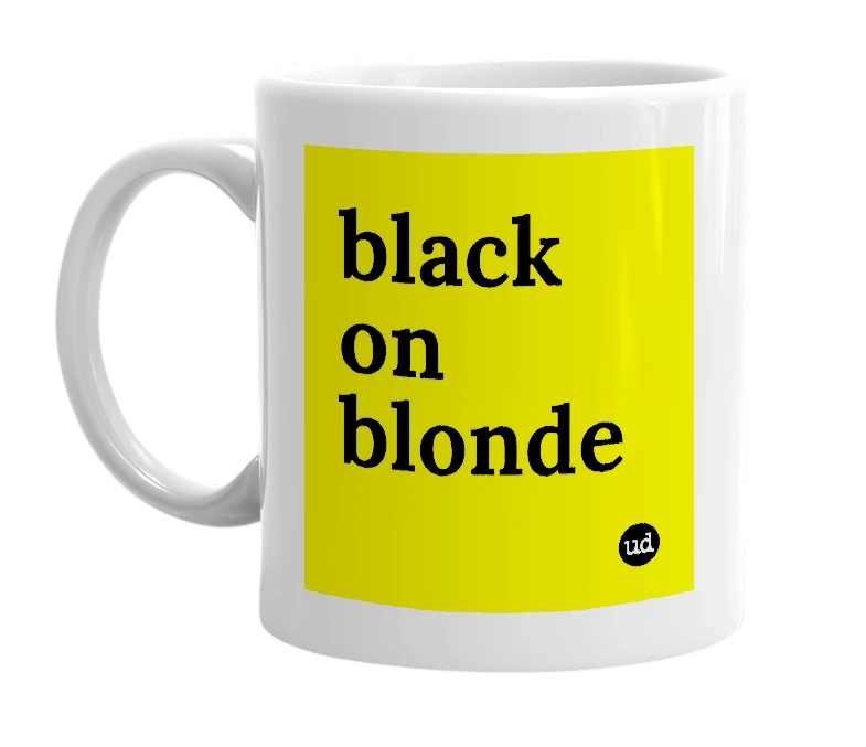 White mug with 'black on blonde' in bold black letters