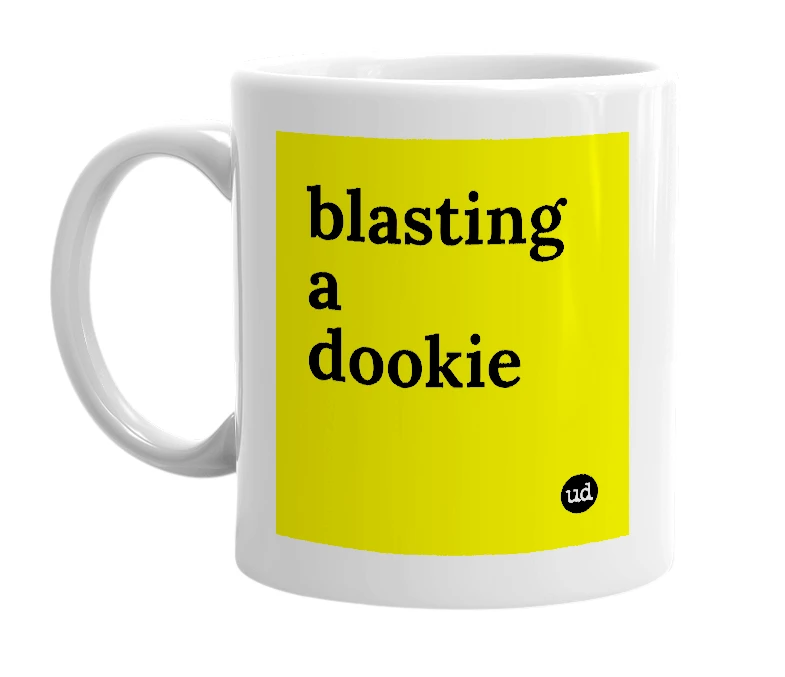 White mug with 'blasting a dookie' in bold black letters