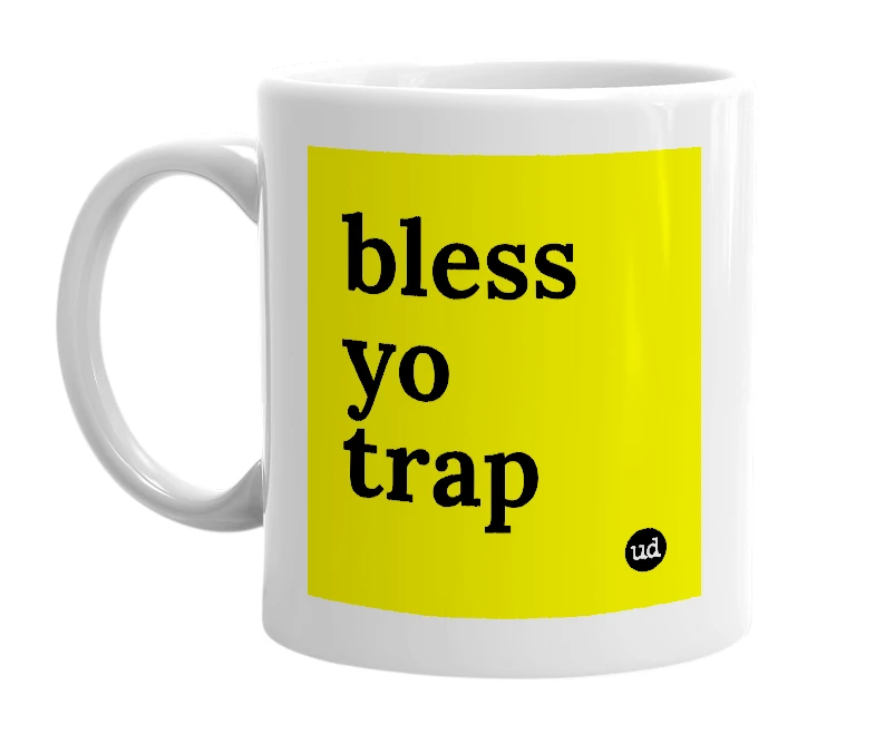 White mug with 'bless yo trap' in bold black letters