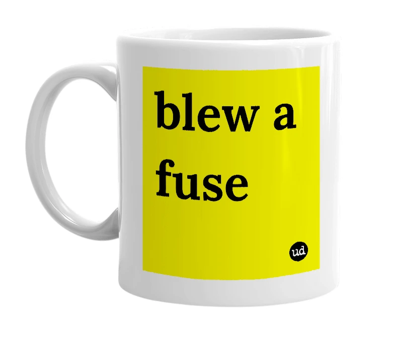 White mug with 'blew a fuse' in bold black letters