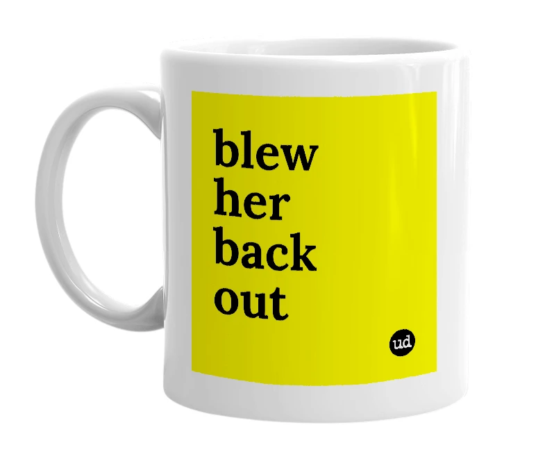 White mug with 'blew her back out' in bold black letters