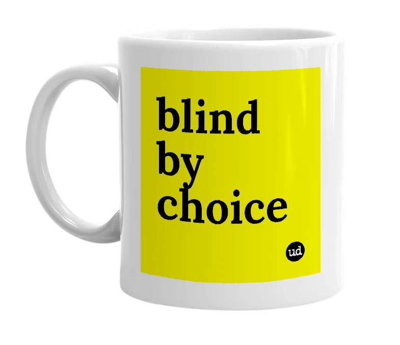 White mug with 'blind by choice' in bold black letters