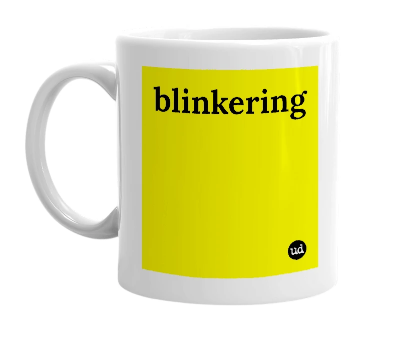 White mug with 'blinkering' in bold black letters