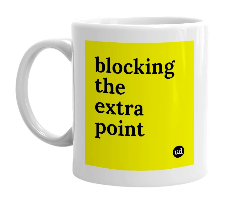 White mug with 'blocking the extra point' in bold black letters