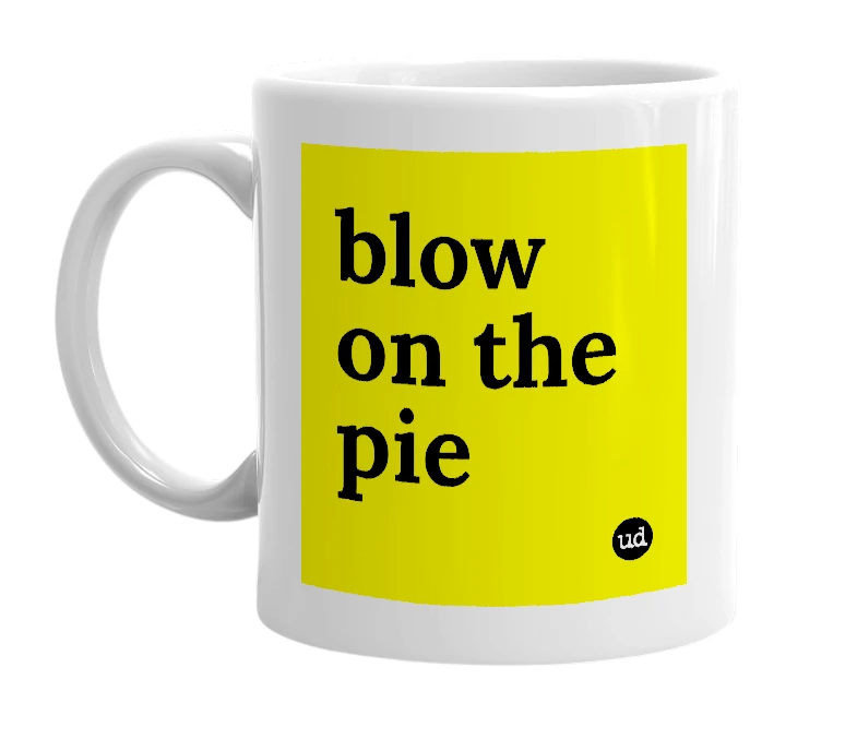 White mug with 'blow on the pie' in bold black letters