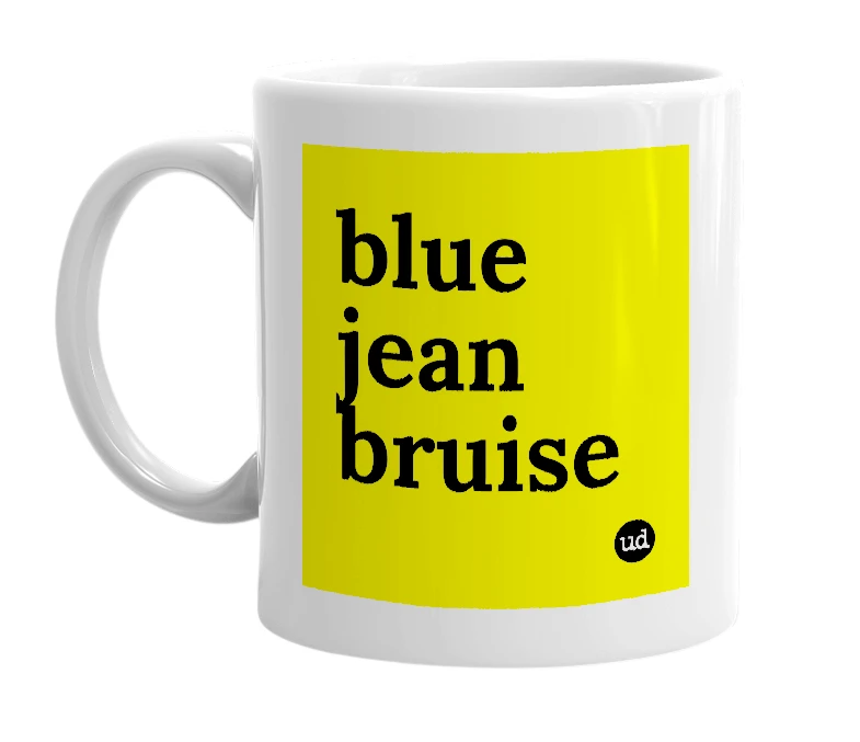 White mug with 'blue jean bruise' in bold black letters