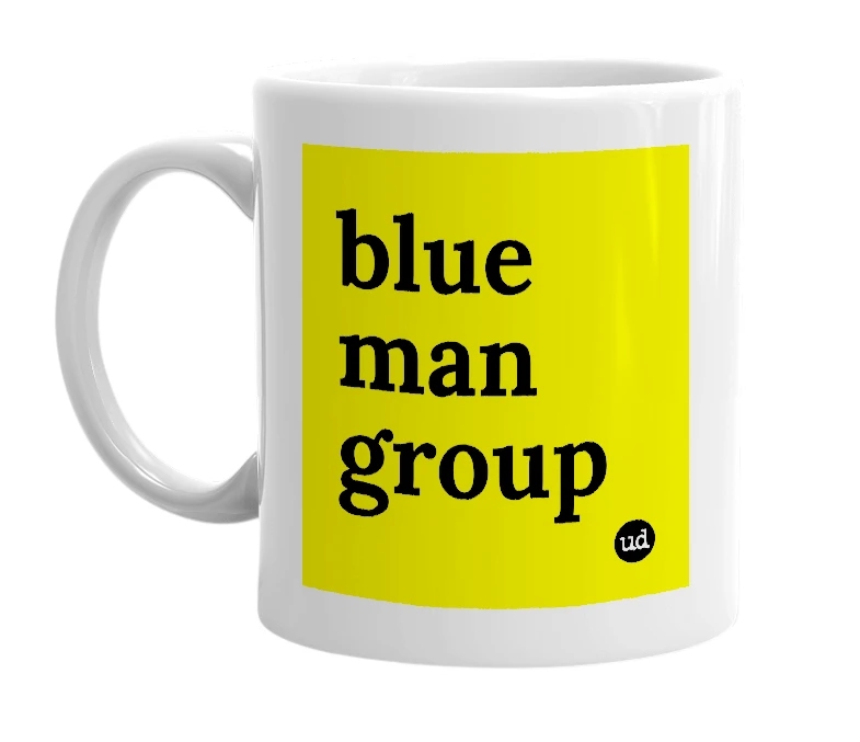 White mug with 'blue man group' in bold black letters