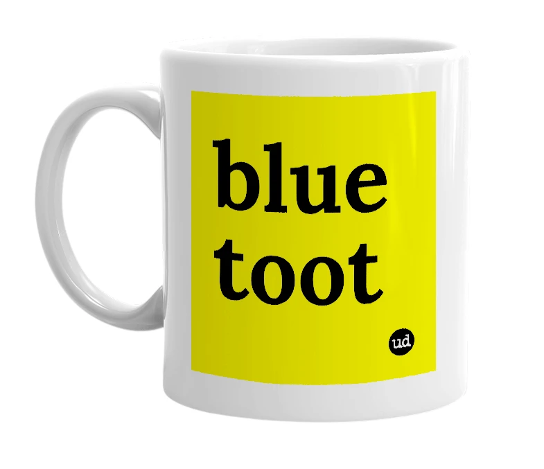 White mug with 'blue toot' in bold black letters