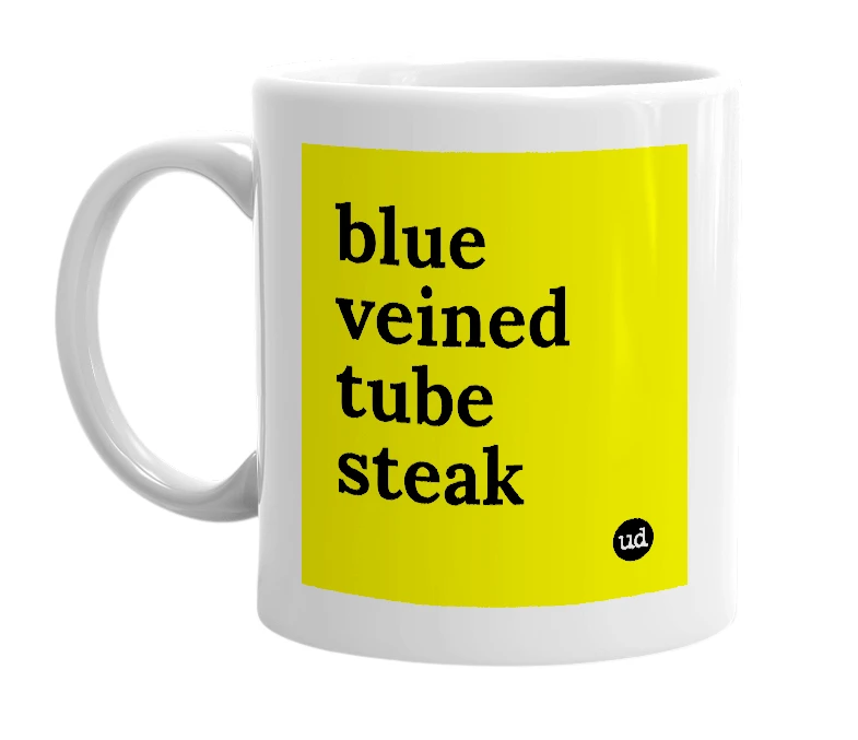 White mug with 'blue veined tube steak' in bold black letters