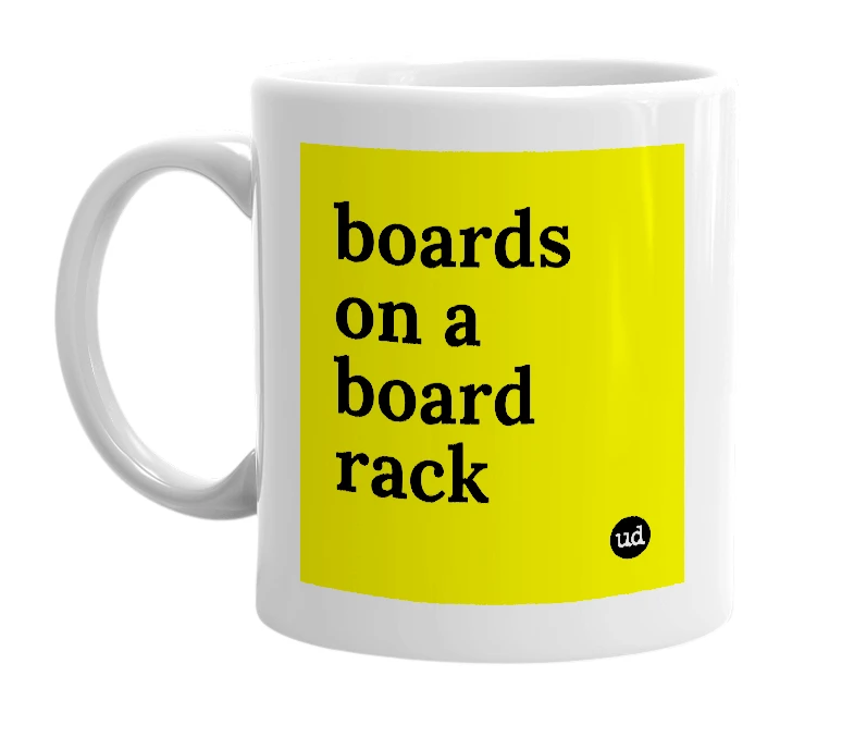 White mug with 'boards on a board rack' in bold black letters